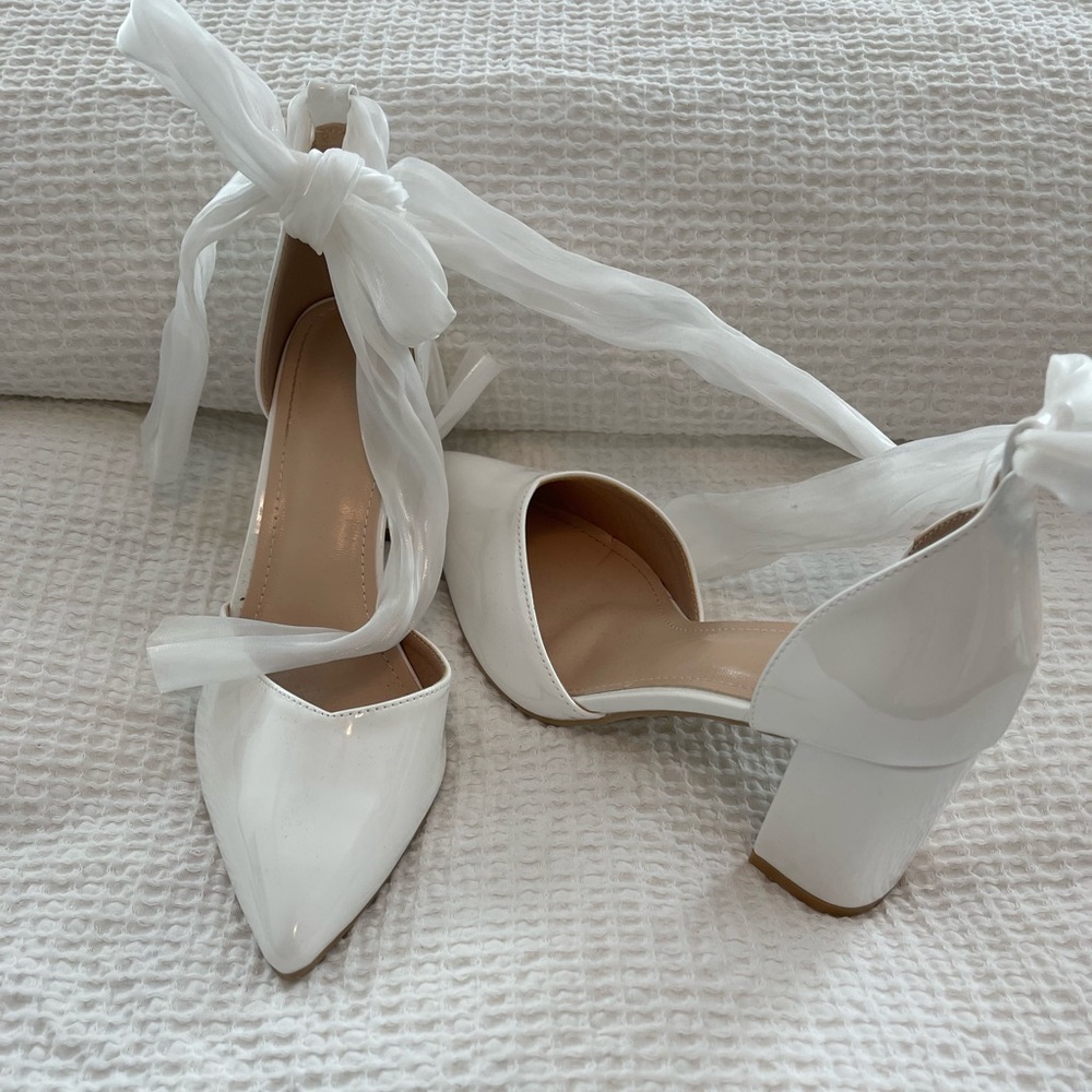 White patent leather lace up heels